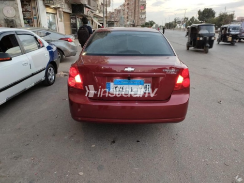 شيفروليه أوبترا 2009 أحمر غامق أوتوماتيك مستعملة للبيع في الإسكندرية - 2