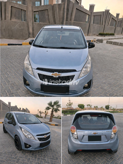 Chevrolet Spark 2012 White Manual Used for Sale in Greater Cairo ( Cairo + Giza) - 6