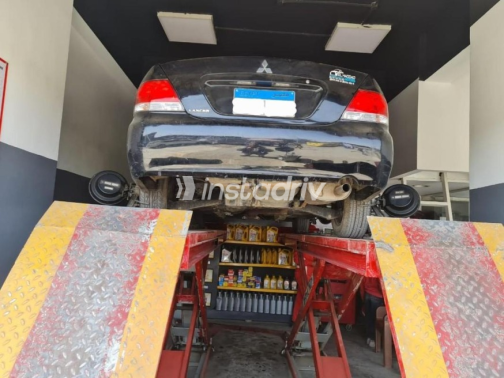 Mitsubishi Lancer Puma 2010 Black Manual Used for Sale in El Minya - 3