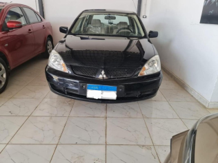Mitsubishi Lancer Puma 2010 Black Manual Used for Sale in El Minya