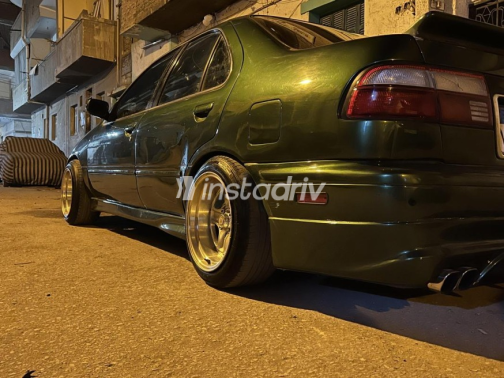 Nissan Sunny 2000 Green Manual Used for Sale in Tanta - 4