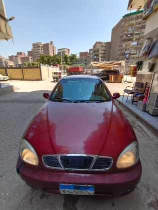 دايو لانوس 2 2001 أبيض أوتوماتيك مستعملة للبيع في القاهرة الكبرى ( القاهرة - الجيزة)