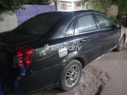 Chevrolet Optra 2006 Black Manual Used for Sale in Cairo - 2
