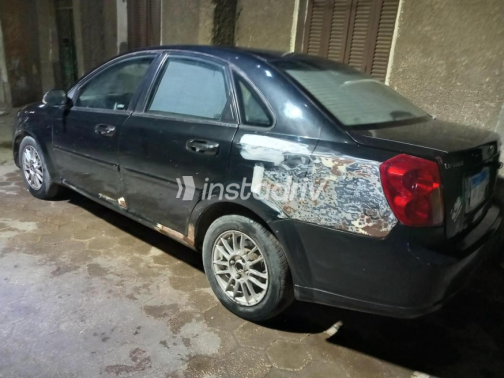 Chevrolet Optra 2006 Black Manual Used for Sale in Cairo - 9
