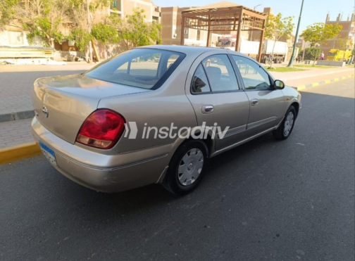 Nissan Sunny 2011 Gold Automatic Used for Sale in Ashmoun - 3
