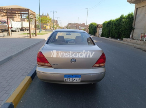 Nissan Sunny 2011 Gold Automatic Used for Sale in Ashmoun - 4