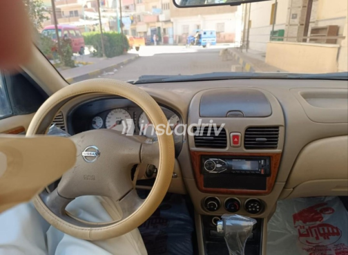 Nissan Sunny 2011 Gold Automatic Used for Sale in Ashmoun - 7