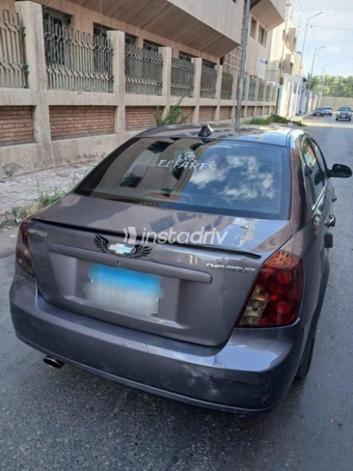 شيفروليه أوبترا 2013 برونزي أوتوماتيك مستعملة للبيع في الإسكندرية - 4