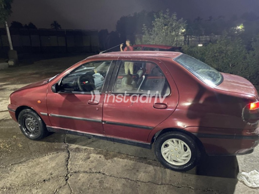 Fiat Siena 2000 Burgundy Manual Used for Sale in Greater Cairo ( Cairo + Giza) - 1