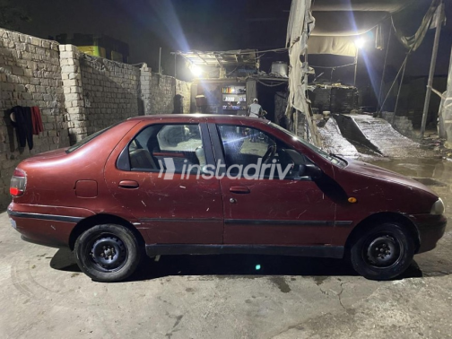Fiat Siena 2000 Burgundy Manual Used for Sale in Greater Cairo ( Cairo + Giza) - 4