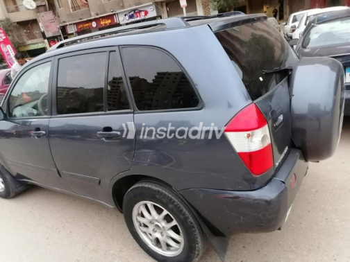 Speranza Tiggo 2010 White Manual Used for Sale in Heliopolis - 9