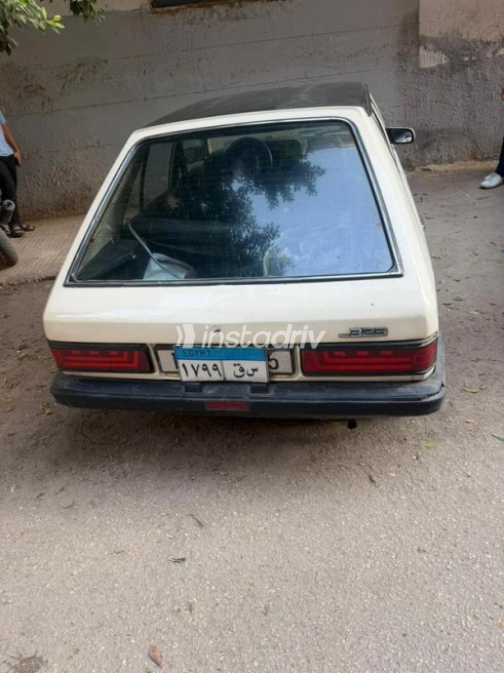 مازدا 323 1981 أبيض يدوي مستعملة للبيع في المهندسين - 6