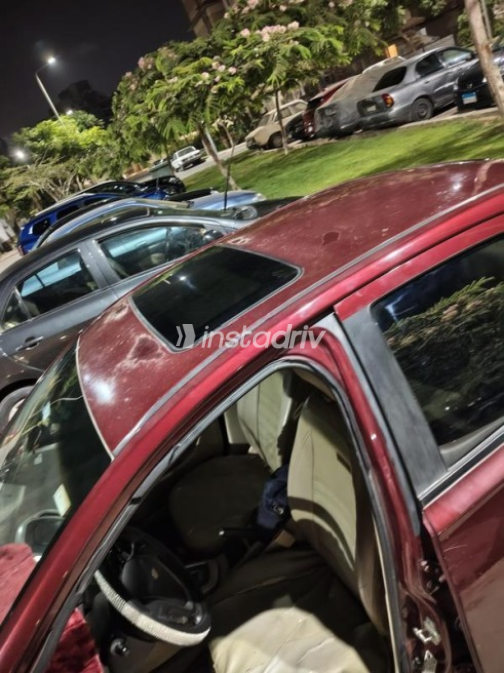 Chevrolet Optra 2019 Dark Red Automatic Used for Sale in Nasr city - 5