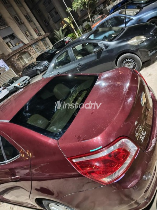 Chevrolet Optra 2019 Dark Red Automatic Used for Sale in Nasr city - 6