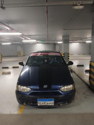 فيات سينا 2002 أزرق غامق يدوي مستعملة للبيع في العجمى