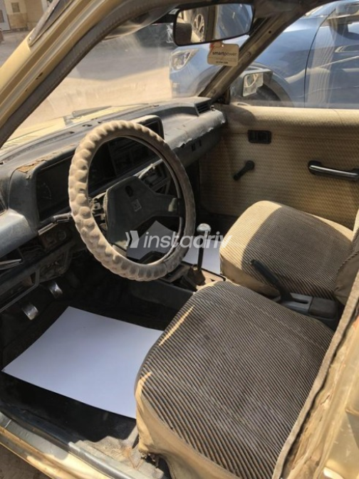 Mazda 323 1982 Gold Manual Used for Sale in Nasr city - 4
