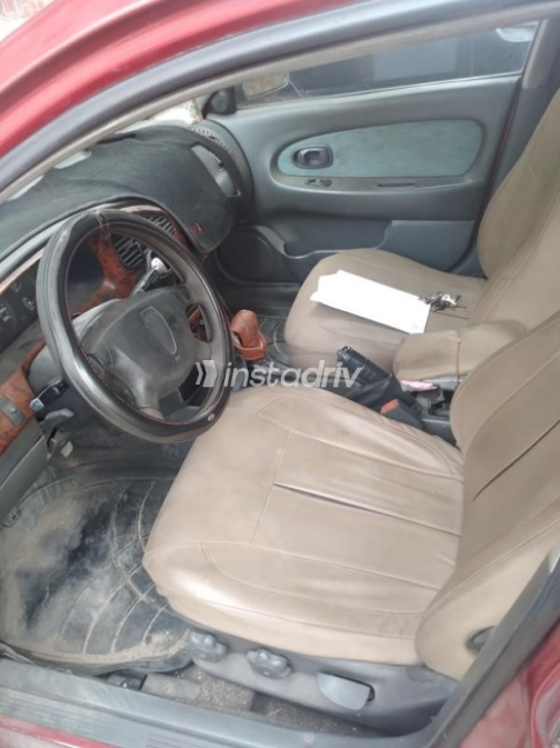 Kia Spectra 2003 Dark Red Manual Used for Sale in Ismailia - 2