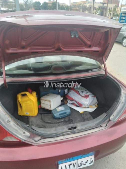 Kia Spectra 2003 Dark Red Manual Used for Sale in Ismailia - 4