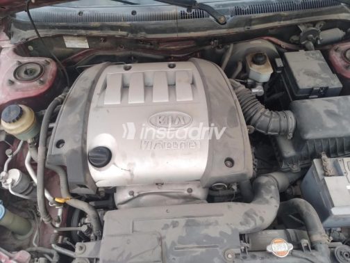 Kia Spectra 2003 Dark Red Manual Used for Sale in Ismailia - 5