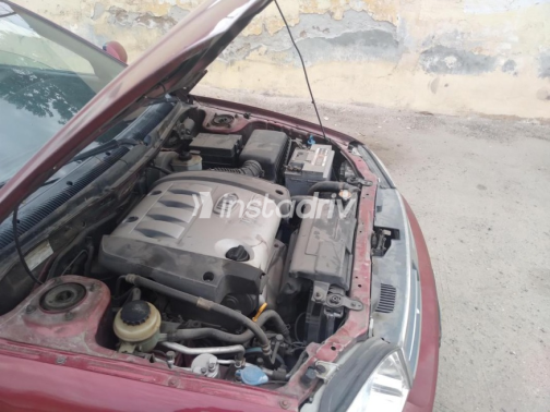 Kia Spectra 2003 Dark Red Manual Used for Sale in Ismailia - 6