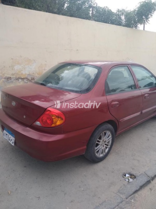 Kia Spectra 2003 Dark Red Manual Used for Sale in Ismailia - 8