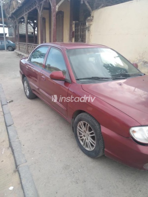 Kia Spectra 2003 Dark Red Manual Used for Sale in Ismailia - 9