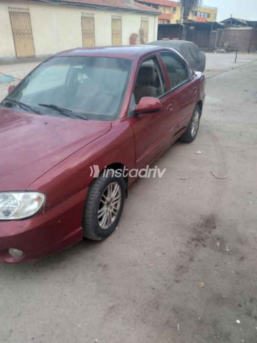 Kia Spectra 2003 Dark Red Manual Used for Sale in Ismailia - 10