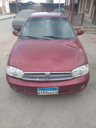 Kia Spectra 2003 Dark Red Manual Used for Sale in Ismailia