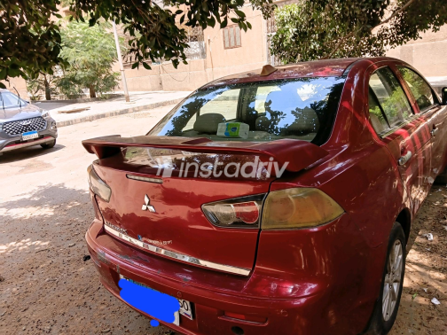 Mitsubishi Lancer 2015 Red Automatic Used for Sale in Greater Cairo ( Cairo + Giza) - 3