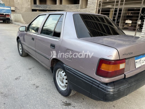 هيونداي اكسيل 1996 ذهبي يدوي مستعملة للبيع في مصر الجديدة - 3