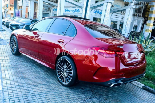 Mercedes C 200 2023 Dark Red Automatic Used for Sale in Madinaty - 2