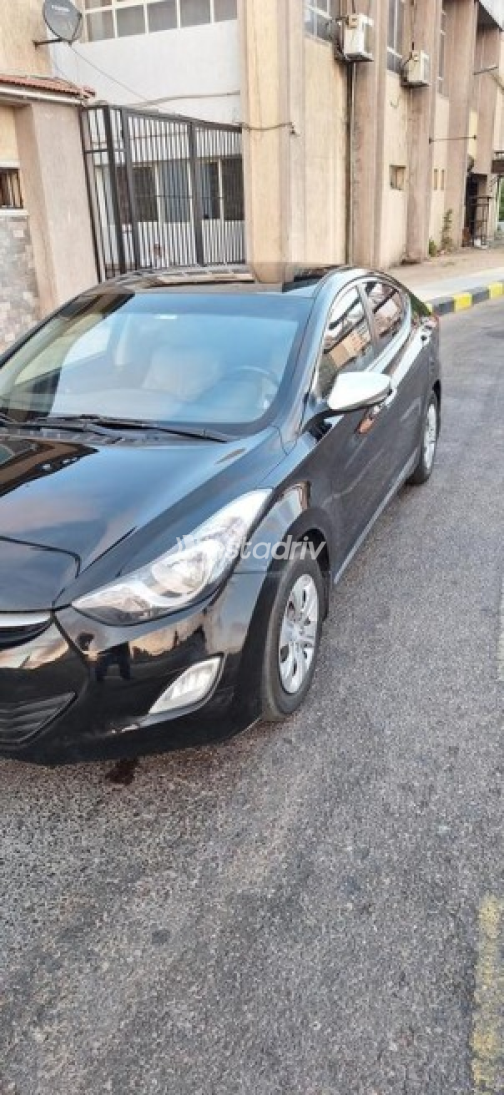 هيونداي إلنترا ام دى 2012 أسود أوتوماتيك مستعملة للبيع في الإسكندرية - 1