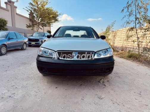 نيسان صنى 2003 أبيض أوتوماتيك مستعملة للبيع في الإسكندرية - 1
