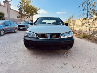 نيسان صنى 2003 أبيض أوتوماتيك مستعملة للبيع في الإسكندرية