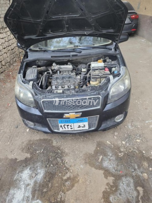 Chevrolet Aveo 2014 Black Automatic Used for Sale in Sheikh Zayed City - 10