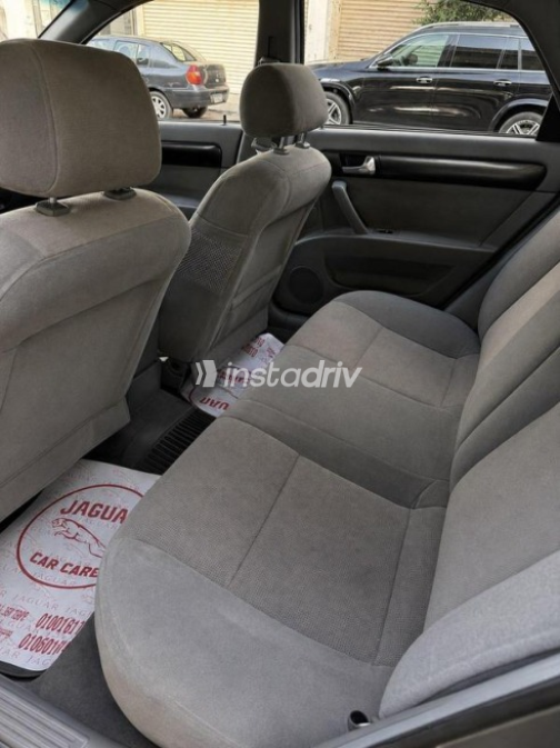 شيفروليه أوبترا 2009 رمادي أوتوماتيك مستعملة للبيع في مدينة نصر - 5