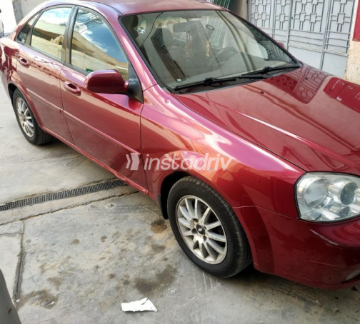 Chevrolet Optra 2011 Dark Red Automatic Used for Sale in Alexandria - 3