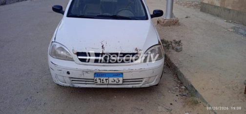 Opel Corsa 2004 White Manual Used for Sale in Sheikh Zayed City - 1