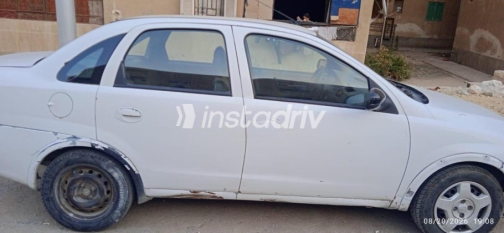 Opel Corsa 2004 White Manual Used for Sale in Sheikh Zayed City - 2
