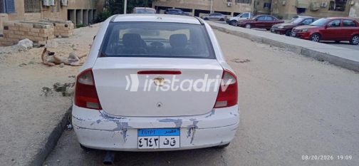 Opel Corsa 2004 White Manual Used for Sale in Sheikh Zayed City - 3