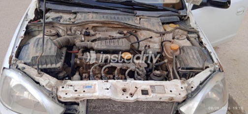 Opel Corsa 2004 White Manual Used for Sale in Sheikh Zayed City - 5