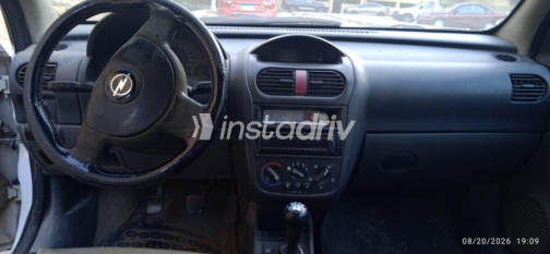 Opel Corsa 2004 White Manual Used for Sale in Sheikh Zayed City - 6