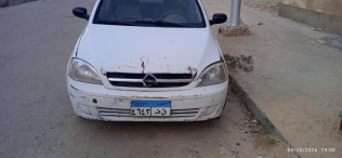 Opel Corsa 2004 White Manual Used for Sale in Sheikh Zayed City