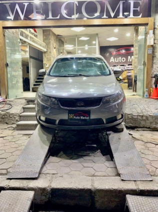 Kia Cerato 2010 Gray Automatic Used for Sale in Nasr city