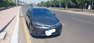 تويوتا كورولا 2017 رمادي أوتوماتيك مستعملة للبيع في مدينة الشيخ زايد