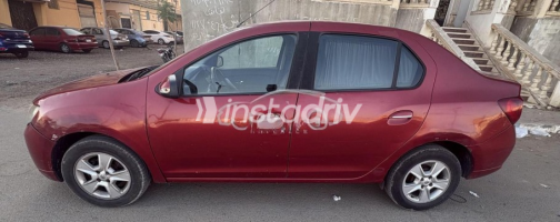 Renault Logan 2015 Dark Red Automatic Used for Sale in Suez  - 2