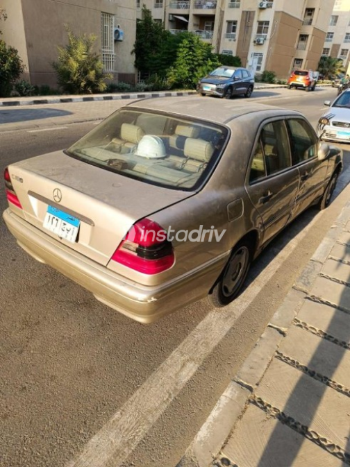 مرسيدس 180 1999 برونزي أوتوماتيك مستعملة للبيع في مدينتى - 9