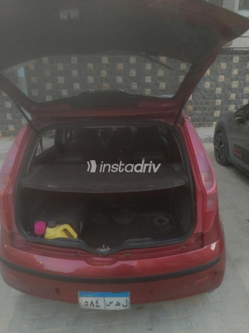 Fiat Punto 2009 Dark Red Manual Used for Sale in Greater Cairo ( Cairo + Giza) - 1