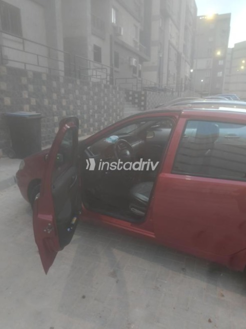 Fiat Punto 2009 Dark Red Manual Used for Sale in Greater Cairo ( Cairo + Giza) - 4