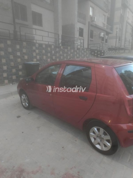 Fiat Punto 2009 Dark Red Manual Used for Sale in Greater Cairo ( Cairo + Giza) - 7